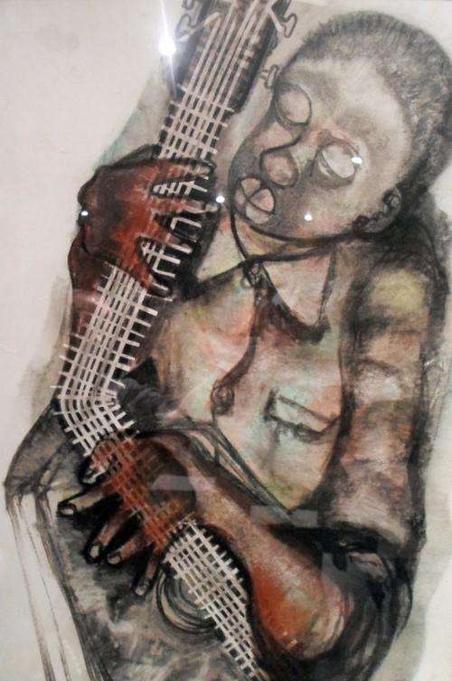 Eric Mbatha - Guitar player - Stunning, marvelous, a must have!! Bid now!!